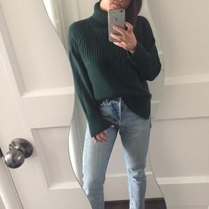Green turtleneck sweater